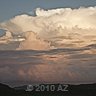 immense mass of clouds turns red at sunset